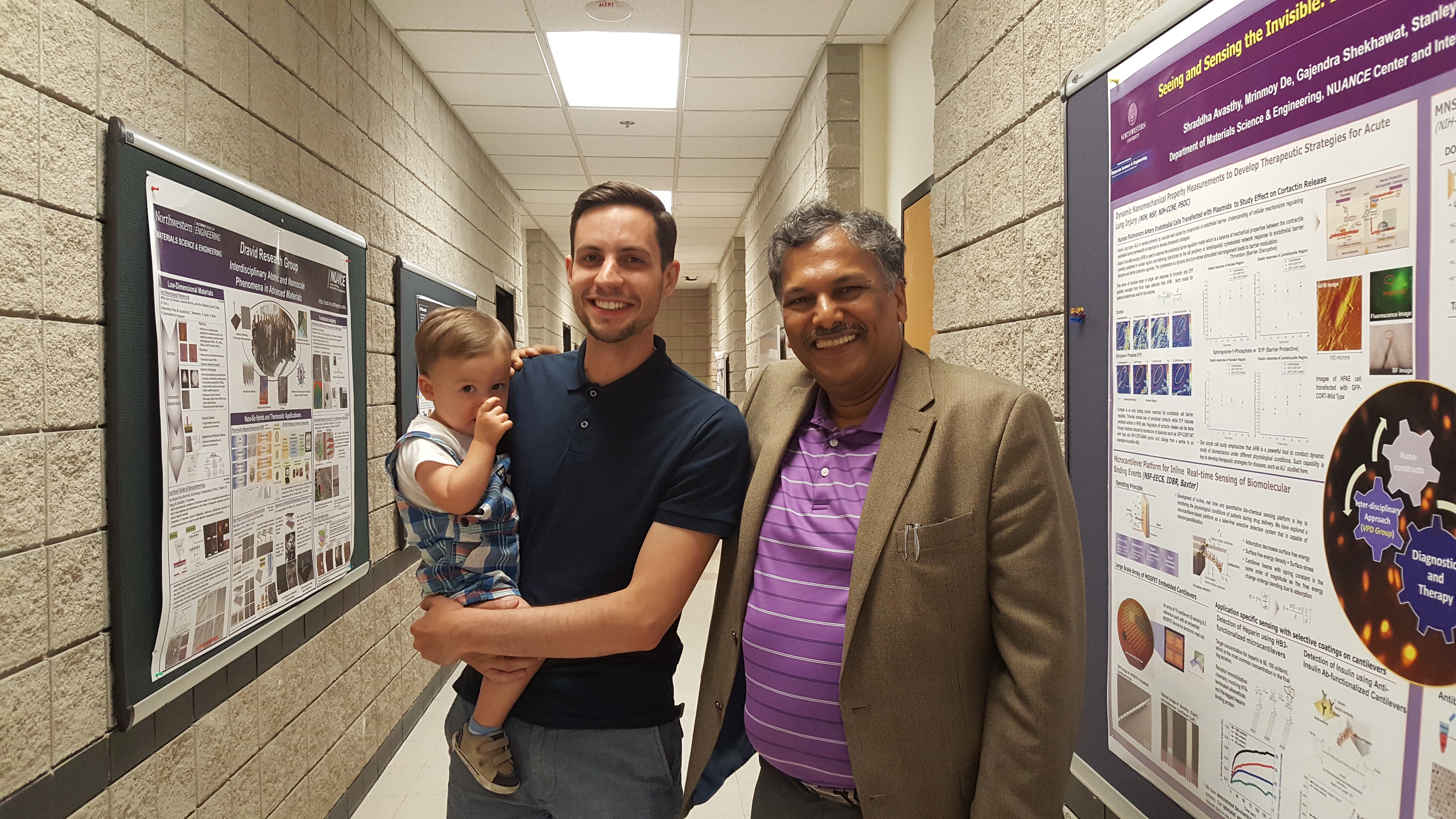 Professor Dravid (right) posed with VPD Group alumnus Jeff Cain and his son Liam.