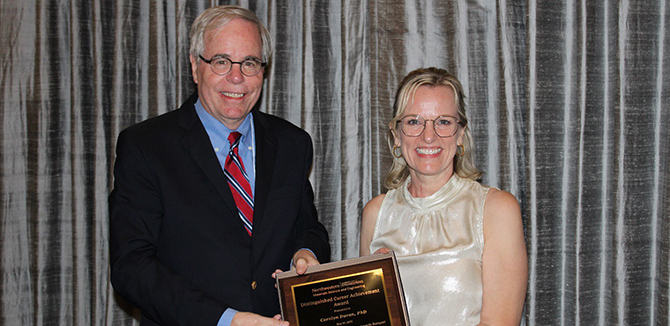 Professor Voorhees presents Dr. Duran with the Distinguished Career Achievement Award