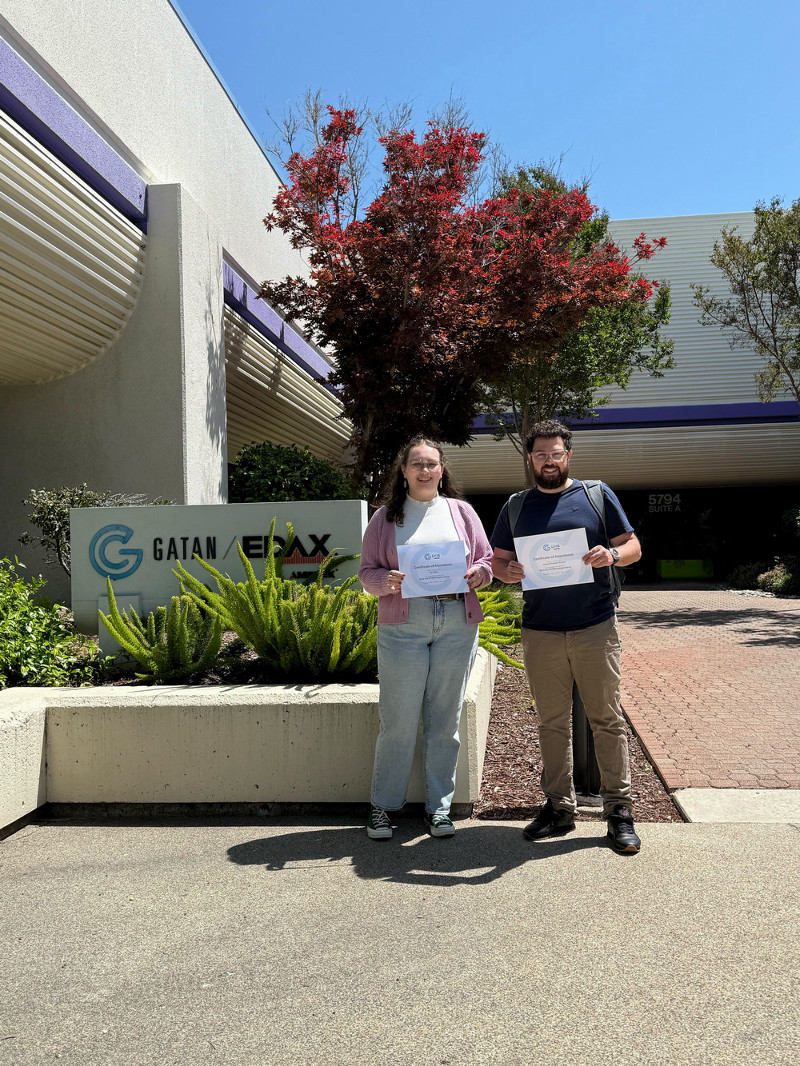 Liz and Gabriel with their certificiates