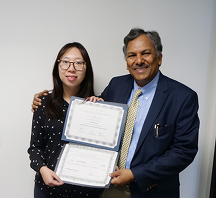 Prof. Dravid with Xiaomi Zhang and her Hilliard Award