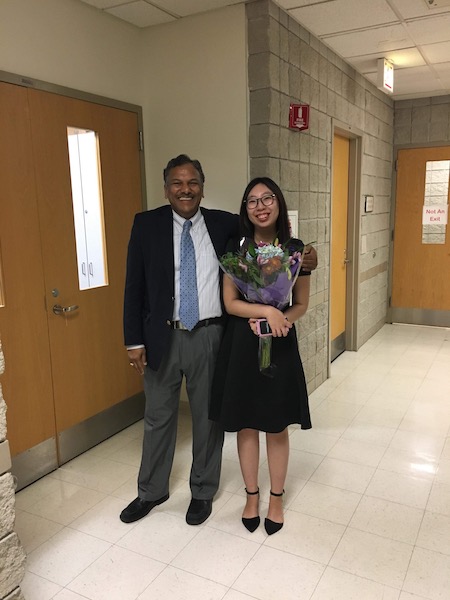 Xiaomi posing with Professor Dravid following her successful thesis defense